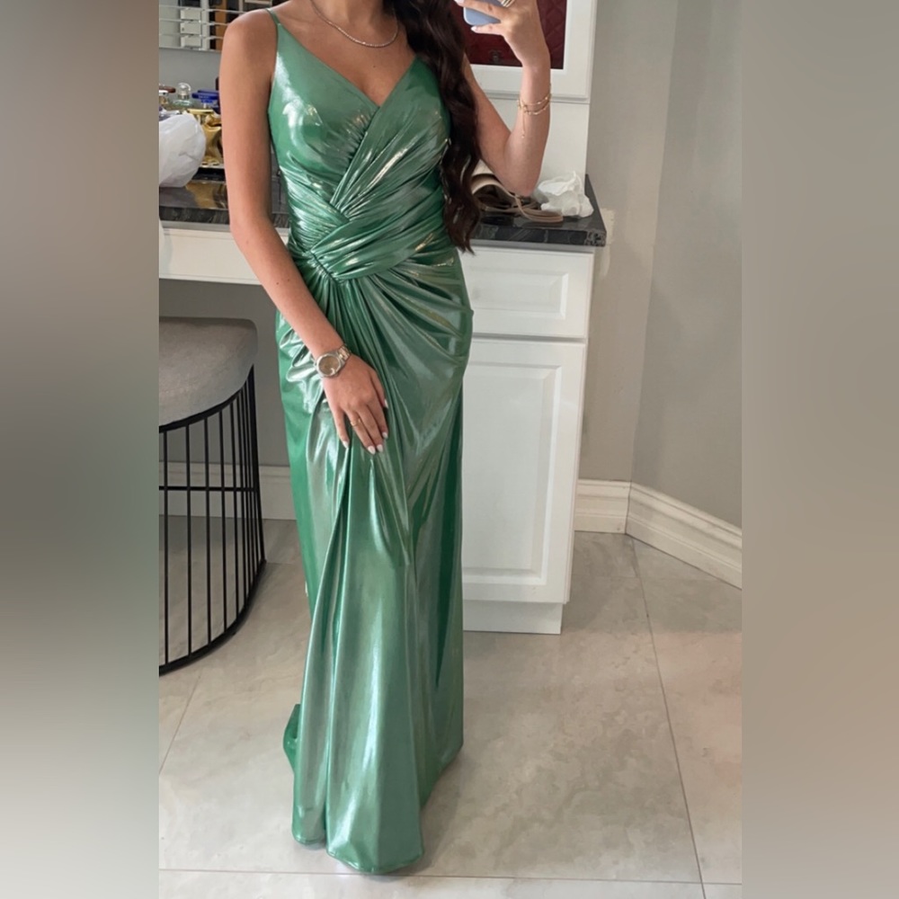 Long metallic green dress with a slit. Size xs.